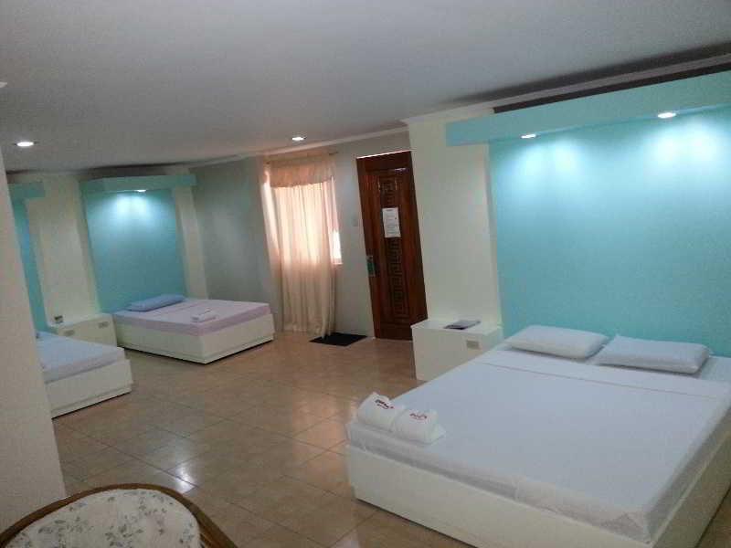 Queen\'S Beach Resort Manoc-Manoc Exteriör bild